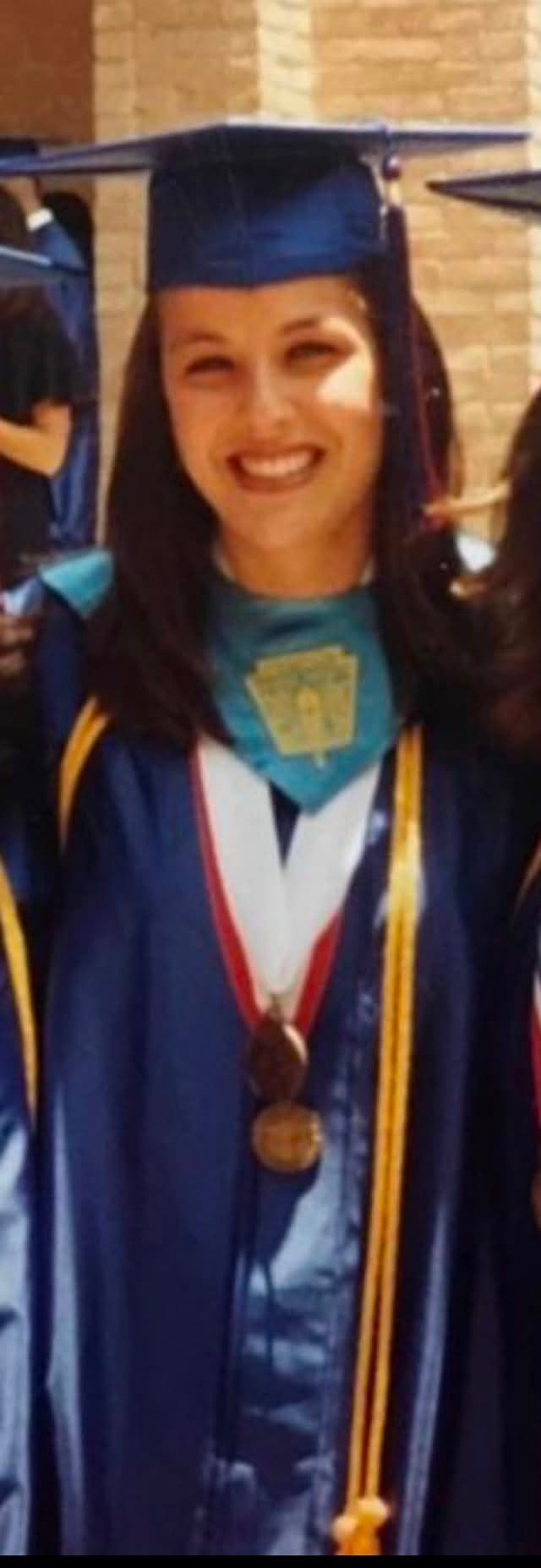 Karla in cap and gown at her Edinburg High School graduation